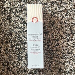 First Aid Beauty Regenerating Serum with Red and White Design